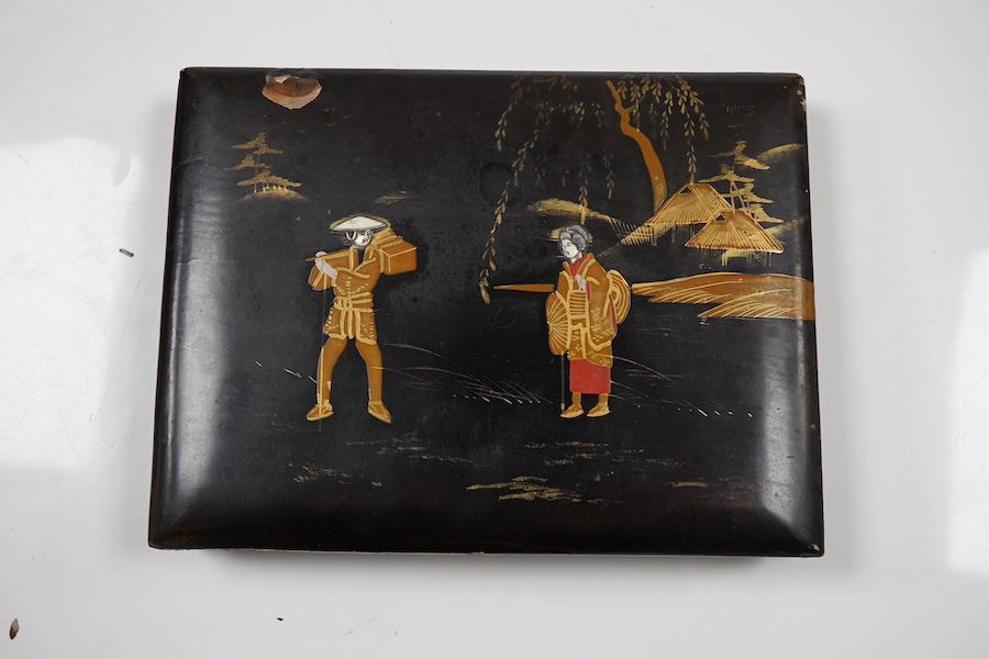 An early 20th century Japanese bone inlaid lacquer photograph album containing coloured photographs of people and Japanese scenes.19.5cm wide x 15.5cm high